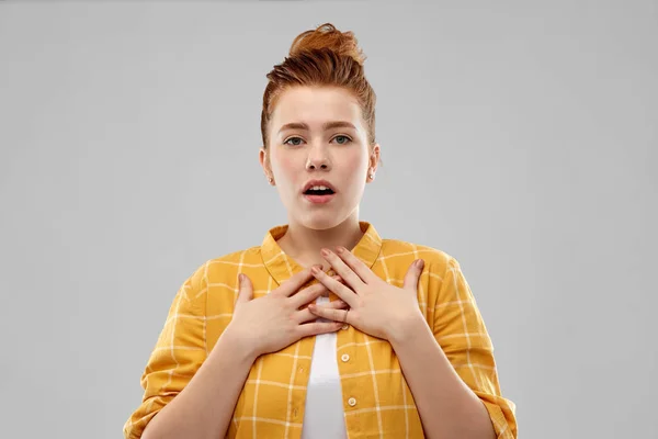 Shocked or surprised red haired teenage girl — Stock Photo, Image