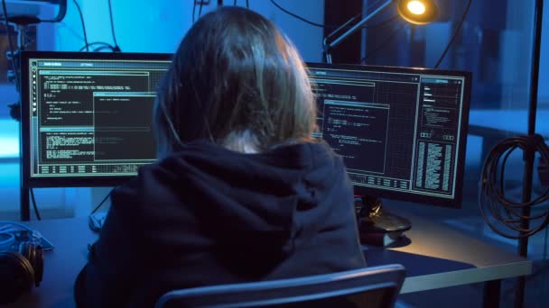 Hacker creating computer virus for cyber attack — Stock Video