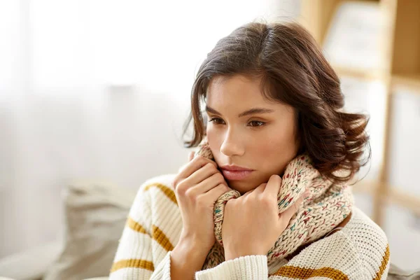 Sad sick woman in scarf at home — Stock Photo, Image