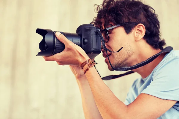 Close up of  photographer with camera shooting — Stock Photo, Image