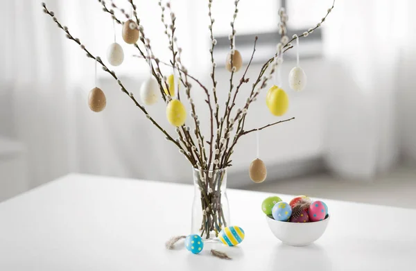 Pussy willow branches decorated by easter eggs — Stock Photo, Image