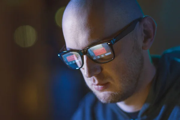 Hacker with access denied reflecting in glasses — Stock Photo, Image