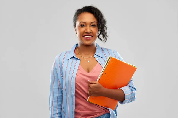 African american student woman with notebooks — Stock Photo, Image