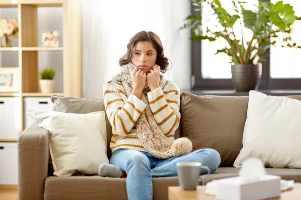 Sad sick woman in scarf at home — Stock Photo, Image