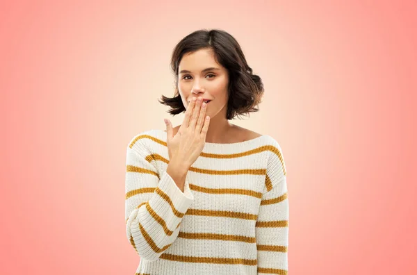 Happy woman covering mouth by hand and giggling — Stock Photo, Image