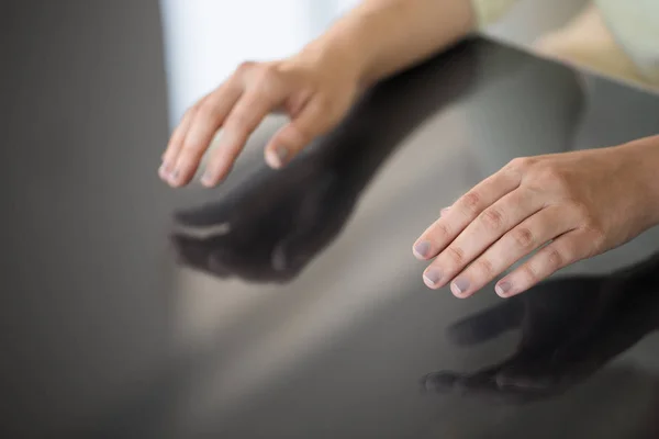 Close up of woman using black interactive panel — Stock Photo, Image