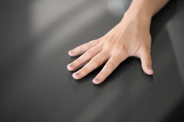 Hand using black interactive panel — Stock Photo, Image