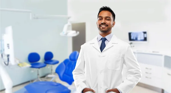 Indian male dentist in white coat at dental clinic — Stock Photo, Image