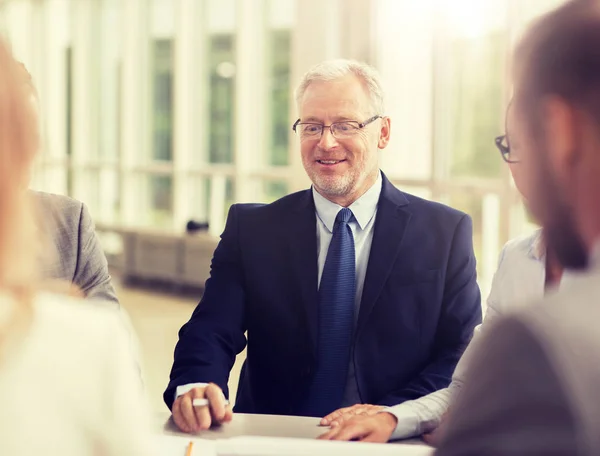 Smiling business people meeting in office — Stock Photo, Image