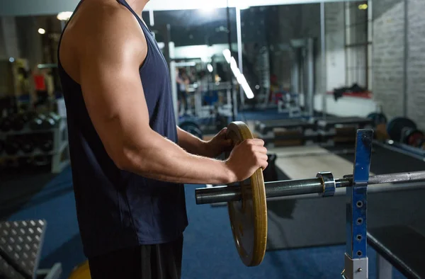 Close up of man man with barbell in gym — Stock Photo, Image