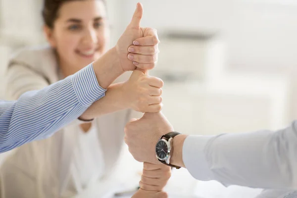Group of business team making thumbs up gesture — Stock Photo, Image