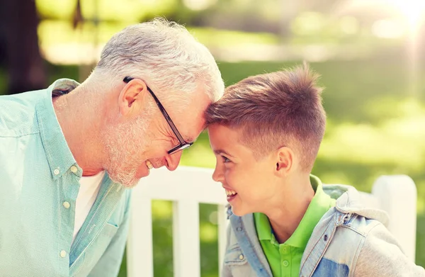 Grandfather and grandson at summer park — Stock Photo, Image