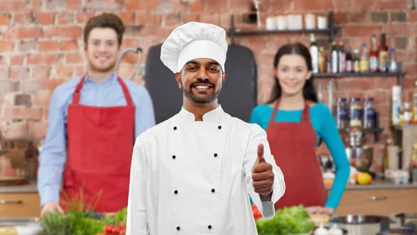 Indian chef showing thumbs up at cooking class — Stock Photo, Image