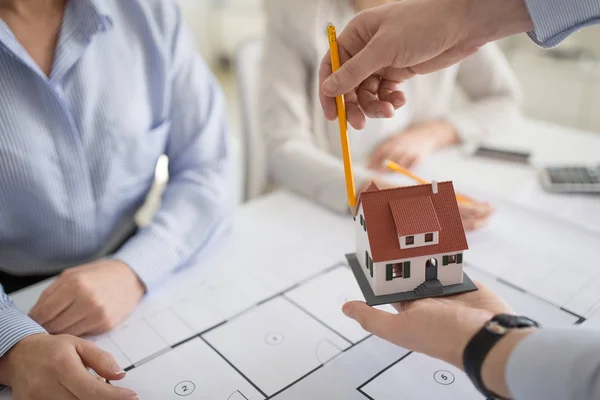 Close up of architects discussing house project — Stock Photo, Image