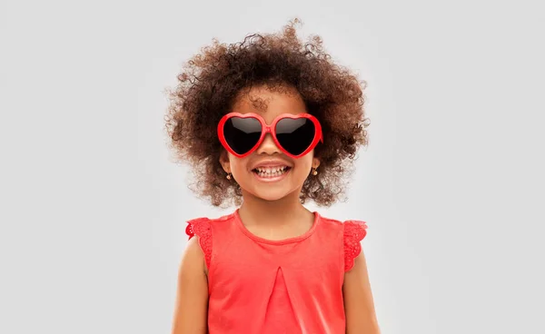 African ameican girl in heart shaped sunglasses — Stock Photo, Image