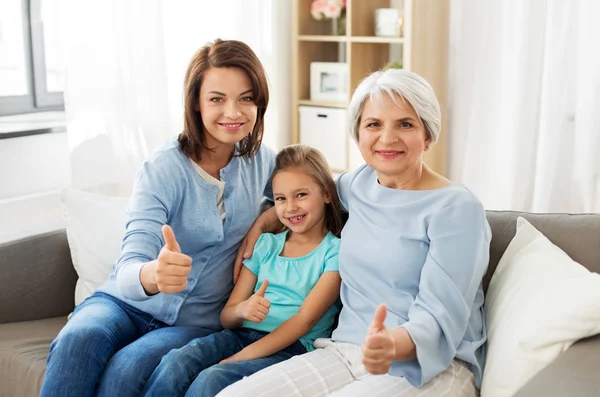 Madre, figlia e nonna mostrando pollici in su — Foto Stock