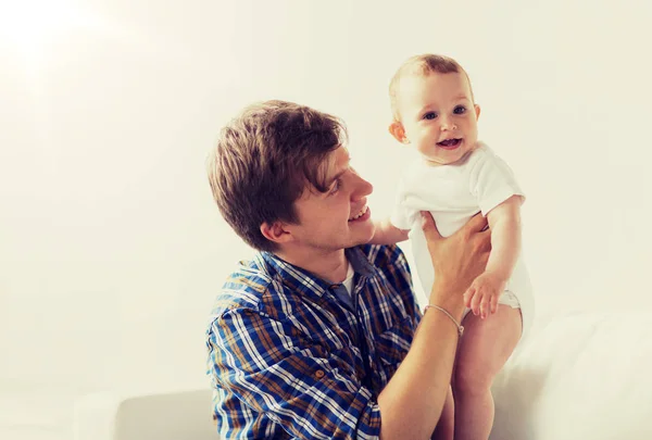 Happy young father with little baby at home — Stock Photo, Image