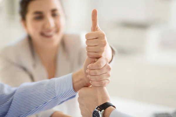 Group of business team making thumbs up gesture — Stock Photo, Image