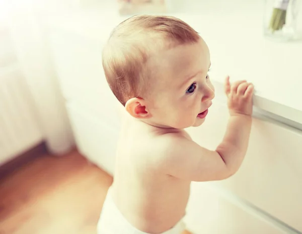 Close up of happy little baby boy or girl at home — Stock Photo, Image