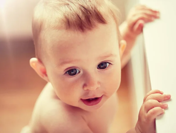 Happy little baby boy or girl at home — Stock Photo, Image