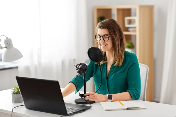 Woman with microphone recording podcast at studio — Stock Photo, Image