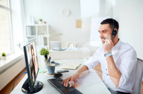 Business man having video call on pc at office — стоковое фото