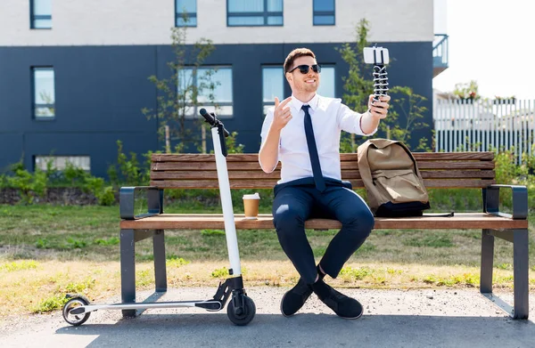 Businessman recording video blog by smartphone — Stock Photo, Image