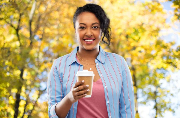 Happy african american woman drinking coffee — Stock Photo, Image