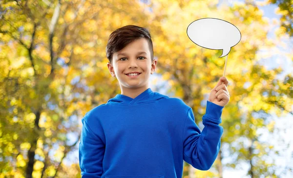 Smiling boy in blue hoodie with speech bubble — Stock Photo, Image