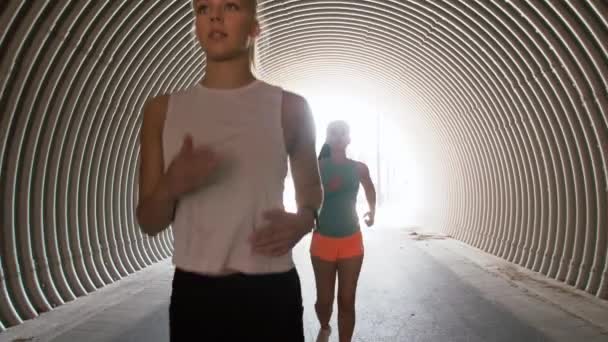 Young women or female friends running outdoors — Stock Video