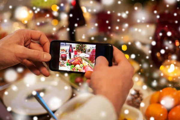 Hænder fotografere mad til jul middag - Stock-foto