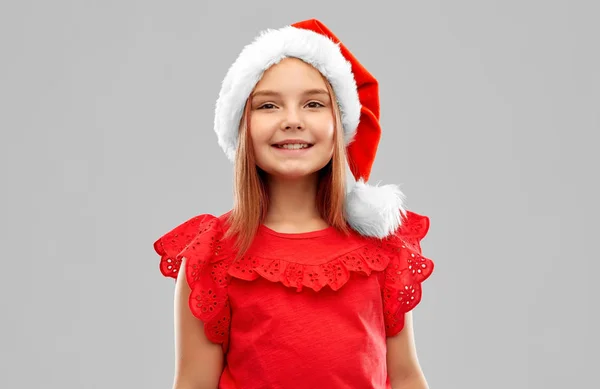 Smiling girl in snata helper hat — Stock Photo, Image