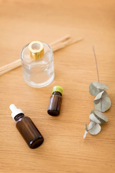 Aroma reed diffuser, essential oil and eucalyptus — Stock Photo, Image