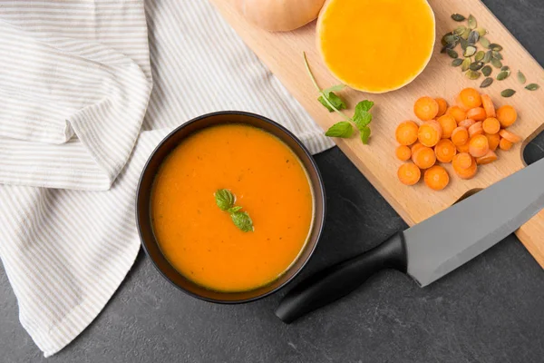 Close up of vegetable pumpkin cream soup in bowl — Stock Image Close up of vegetable pumpkin cream soup in bowl Royalty Free Stock Photos