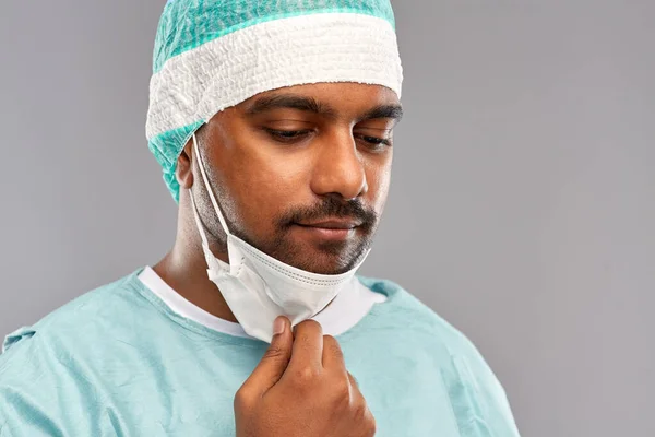 Face of sad doctor or surgeon with protective mask — Stock Photo, Image