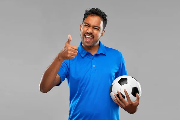 stock image football fan with soccer ball showing thumbs up