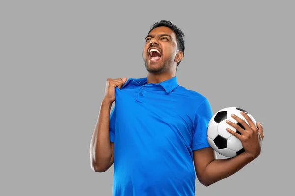 Angry indian male football fan with soccer ball — Stock Photo, Image
