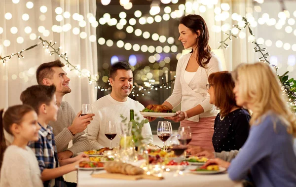 Happy family having dinner party at home — Stock Photo, Image