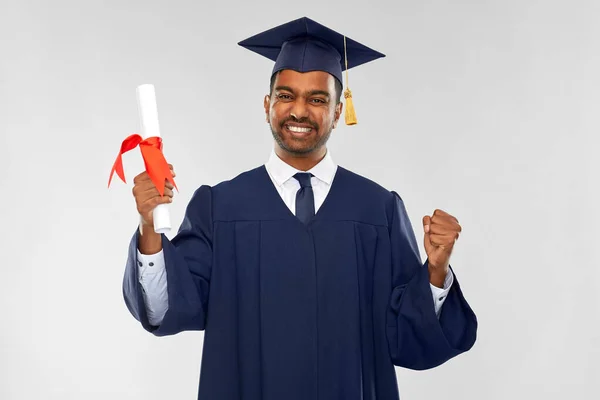 Glad doktorand i kartong med diplom — Stockfoto
