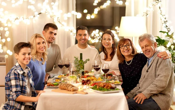 Happy family having dinner party at home — Stock Photo, Image