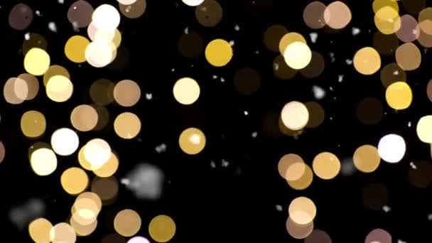 Shimmering golden christmas lights and snow — Stock Video