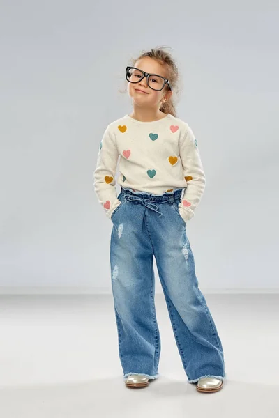 Smiling little girl in glasses — Stock Photo, Image