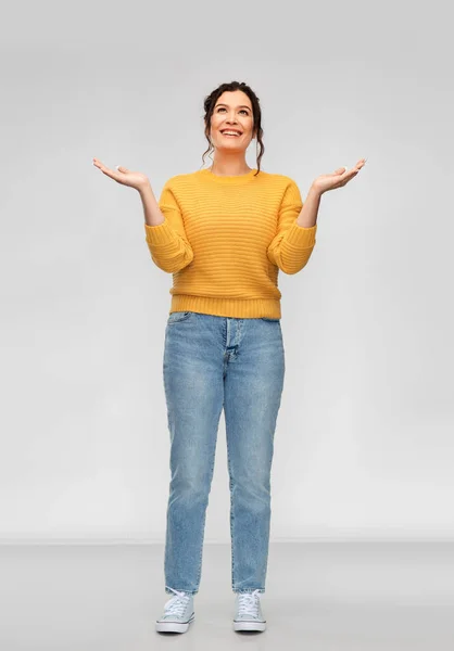 Happy grateful woman looking up — Stockfoto