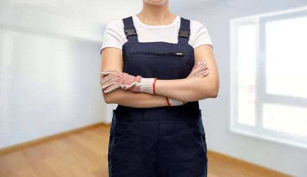 Close up of female painter or builder in overall — Stock Photo, Image