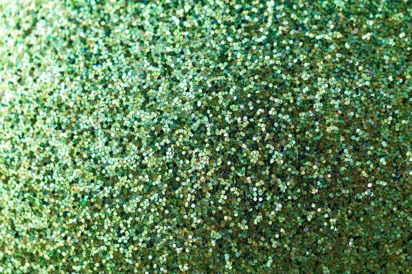 Glitters verdes ou lantejoulas fundo — Fotografia de Stock