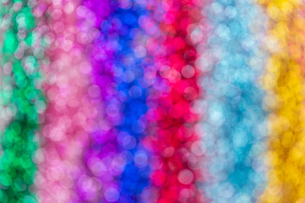 Purpurina multicolor o lentejuelas fondo bokeh — Foto de Stock