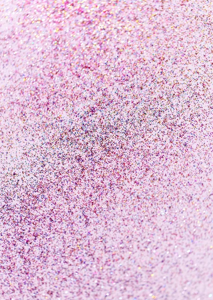 Flerfärgat glitter på vit bakgrund — Stockfoto
