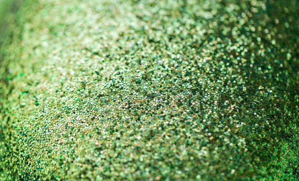 Green glitters or sequins background — Stock Photo, Image