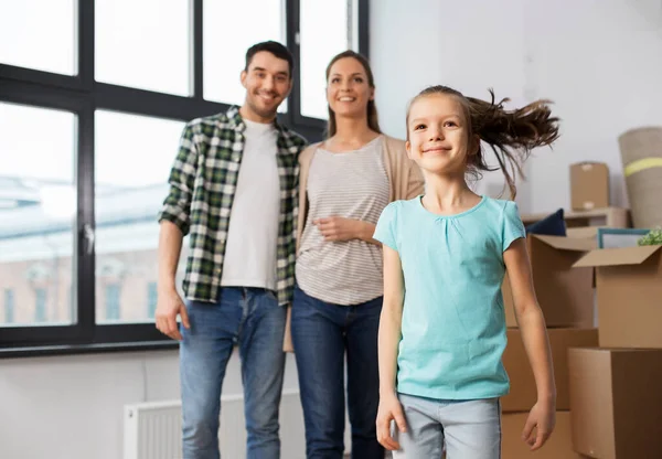 Happy family with child moving to new home — Stock Photo, Image