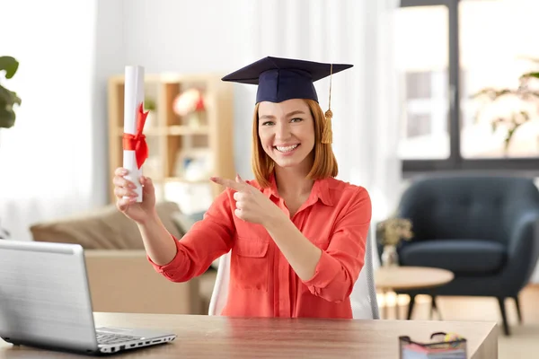 Student woman with laptop and diploma at home — Stock Photo, Image